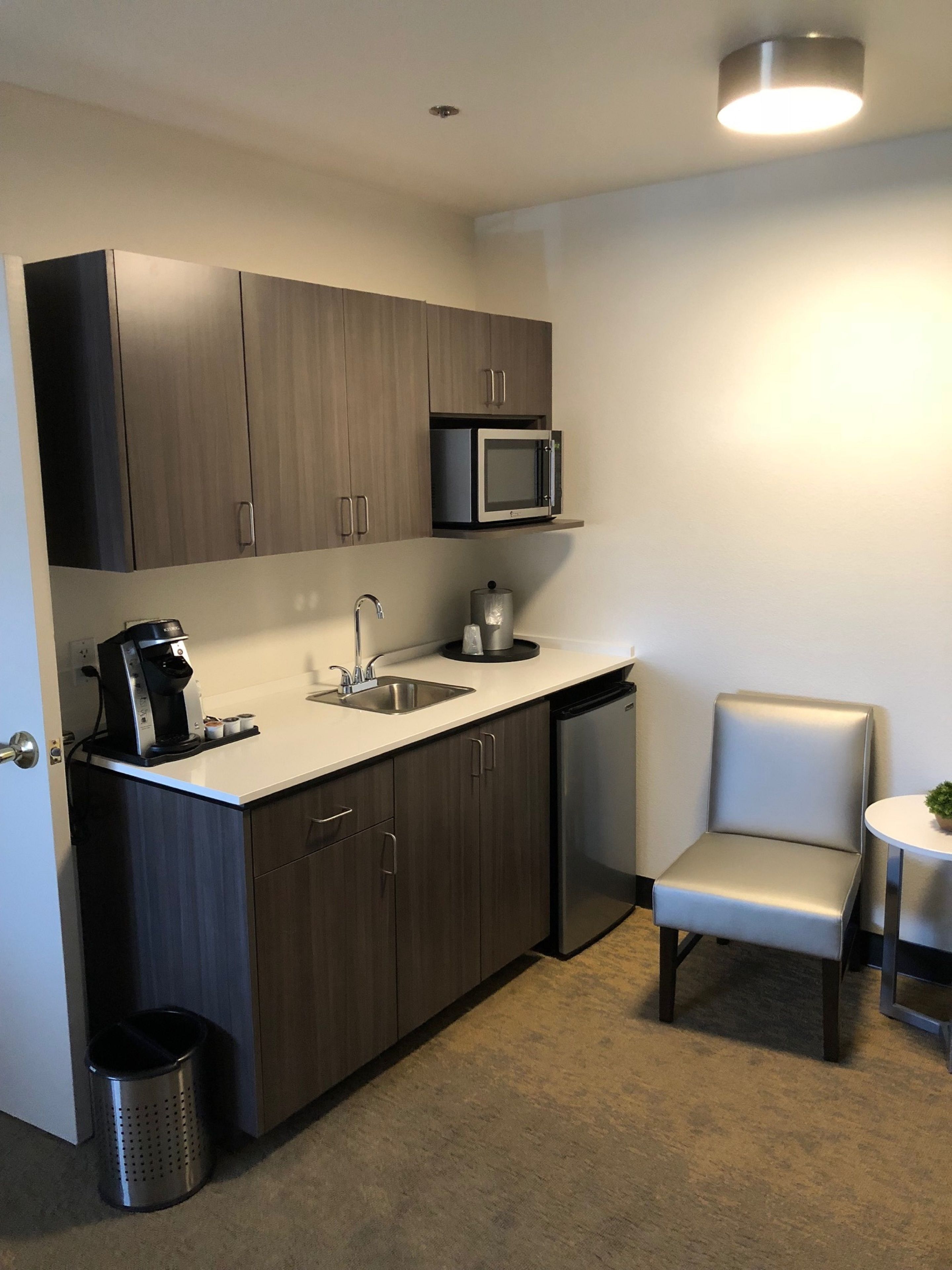 suite, 1 king bed, jetted tub | 1 bedroom, desk, iron/ironing board, free cots/infant beds