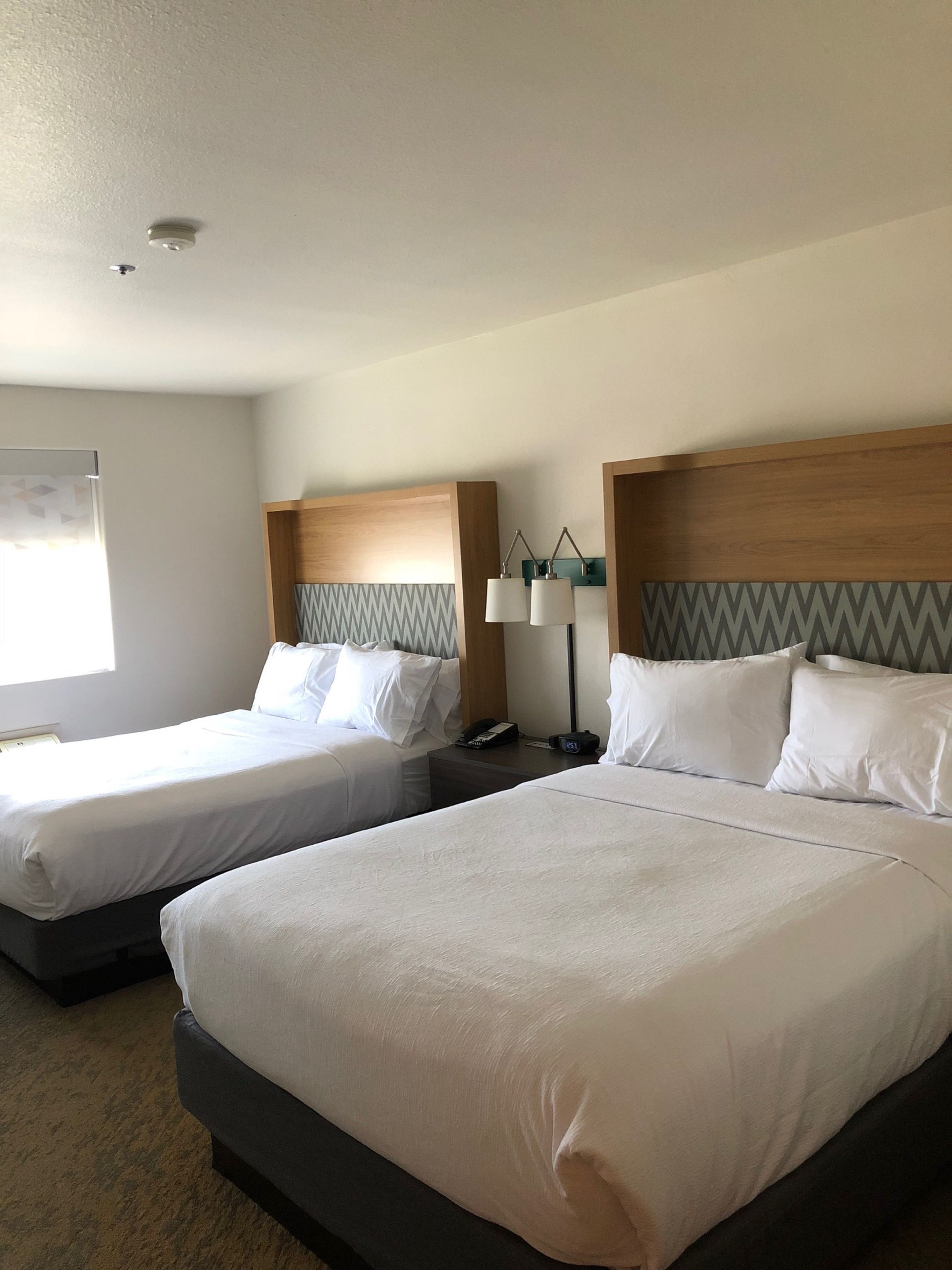 standard room, 2 queen beds | 1 bedroom, desk, iron/ironing board, free cots/infant beds