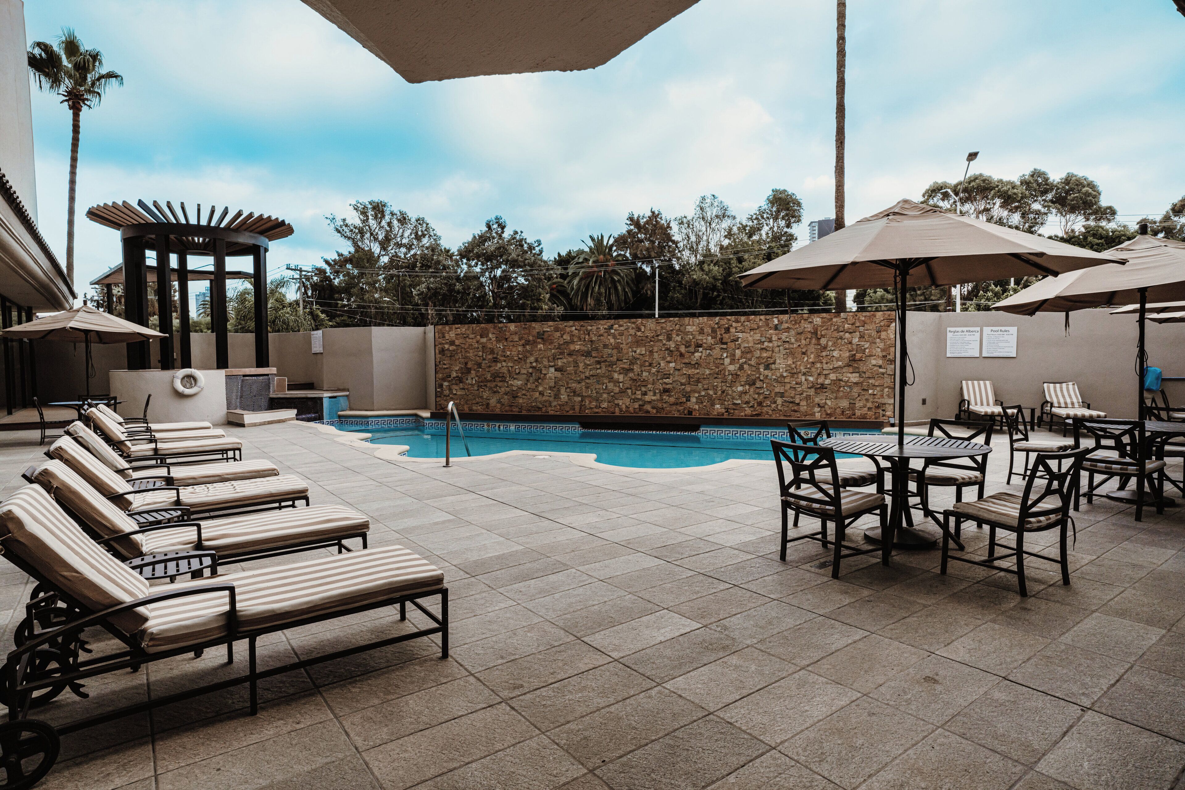 outdoor pool, pool loungers