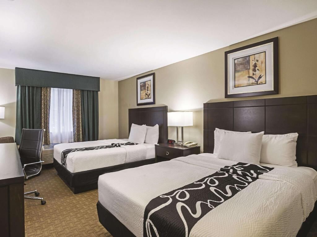 Premium bedding, pillowtop beds, desk, blackout drapes