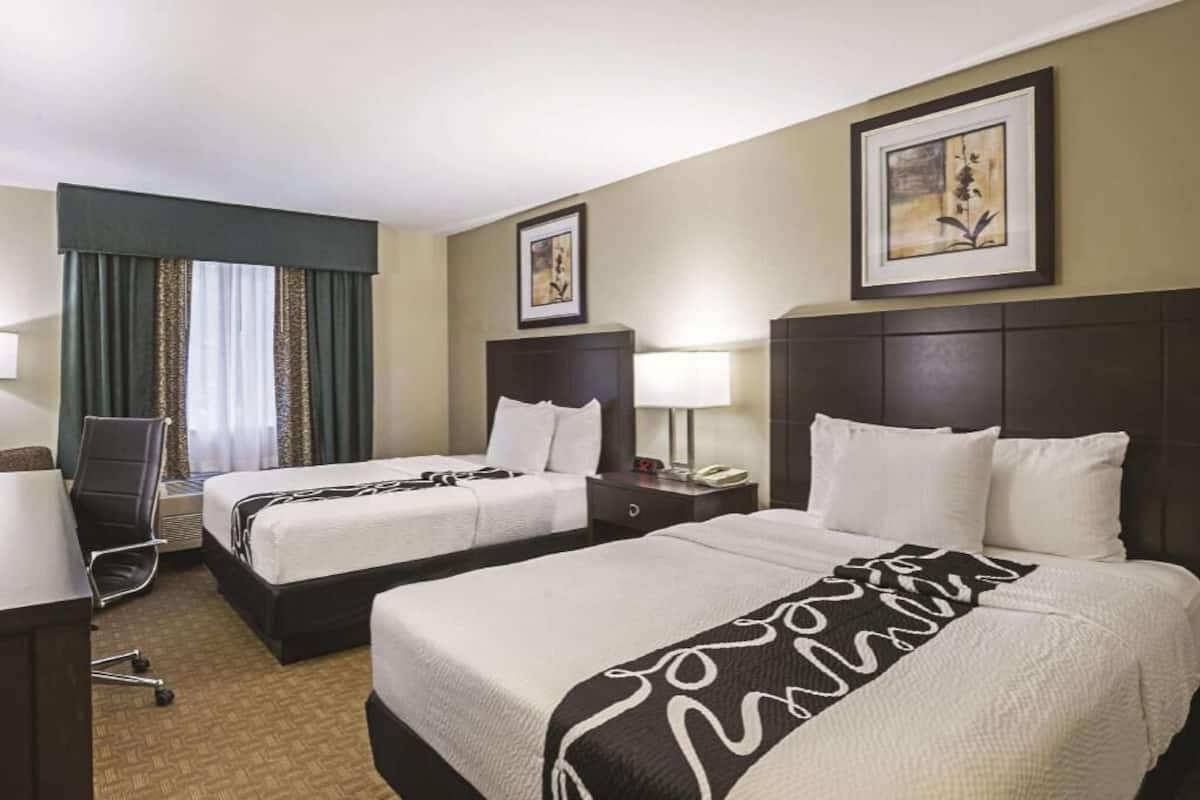 Premium bedding, pillowtop beds, desk, blackout drapes