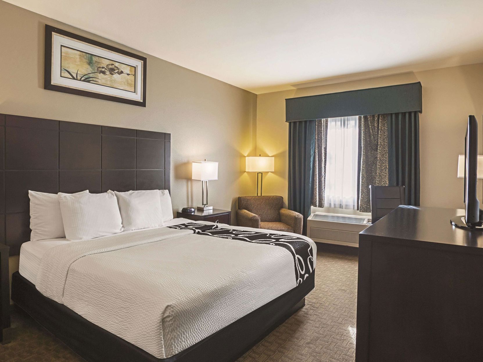 Premium bedding, pillowtop beds, desk, blackout drapes