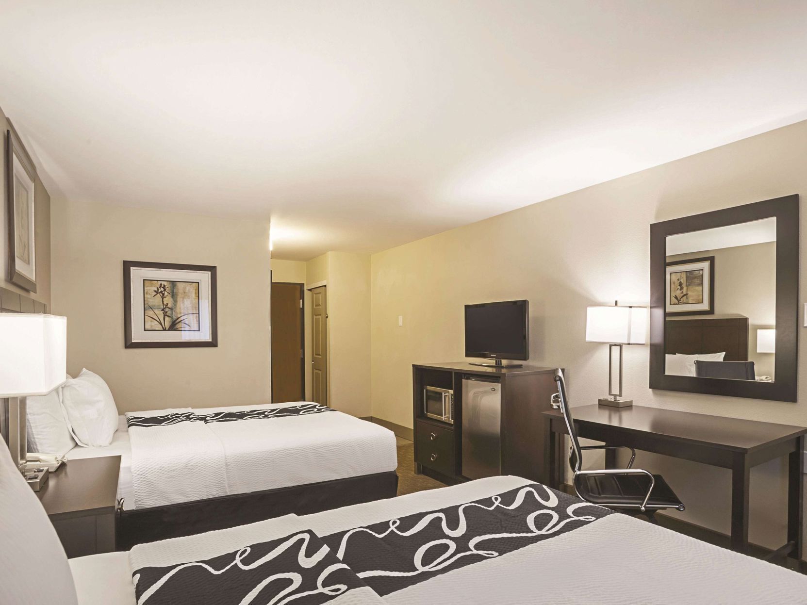 Premium bedding, pillowtop beds, desk, blackout drapes