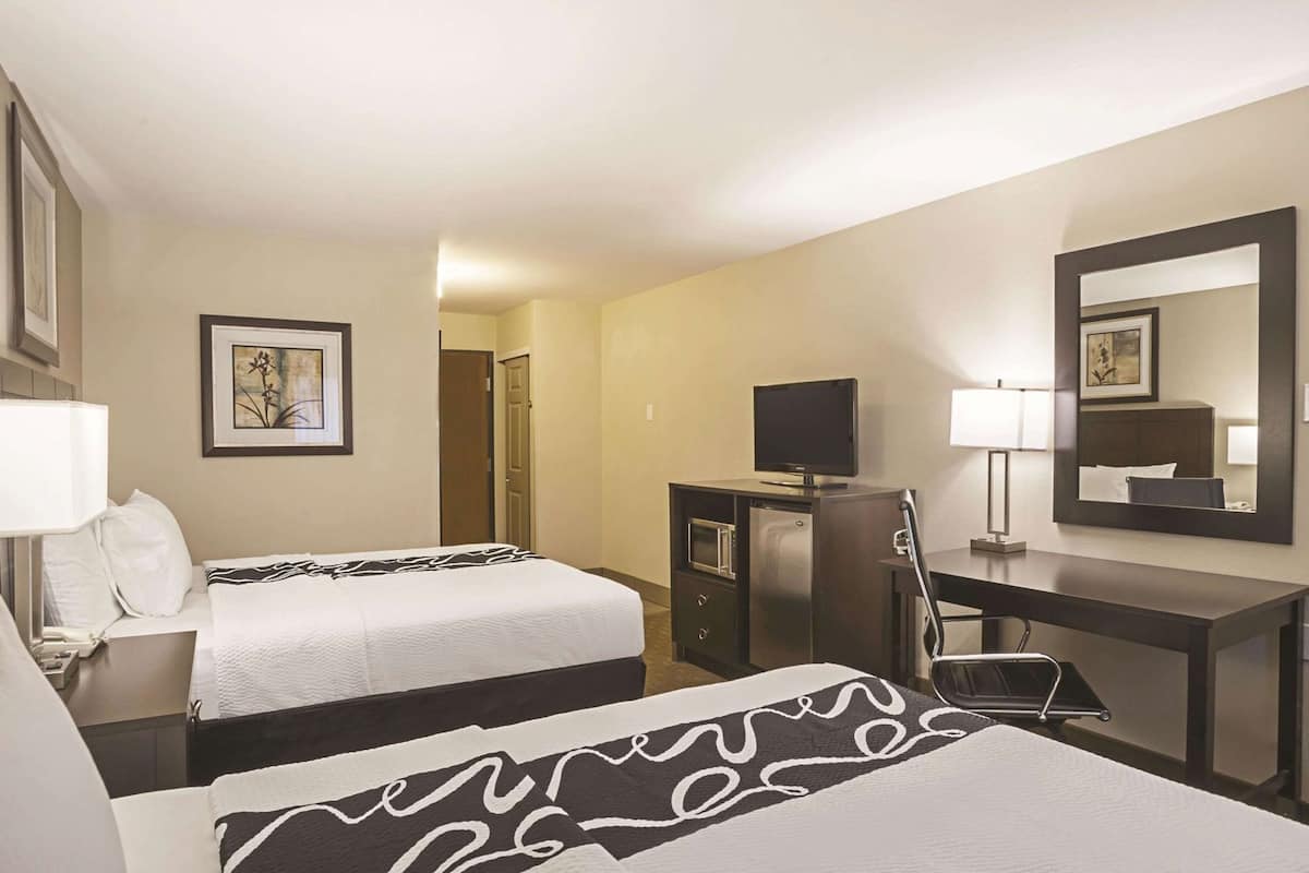 Premium bedding, pillowtop beds, desk, blackout drapes