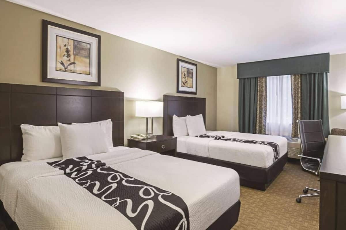 Premium bedding, pillowtop beds, desk, blackout drapes