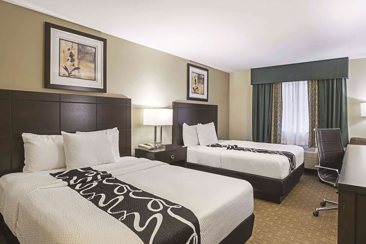 Premium bedding, pillowtop beds, desk, blackout drapes