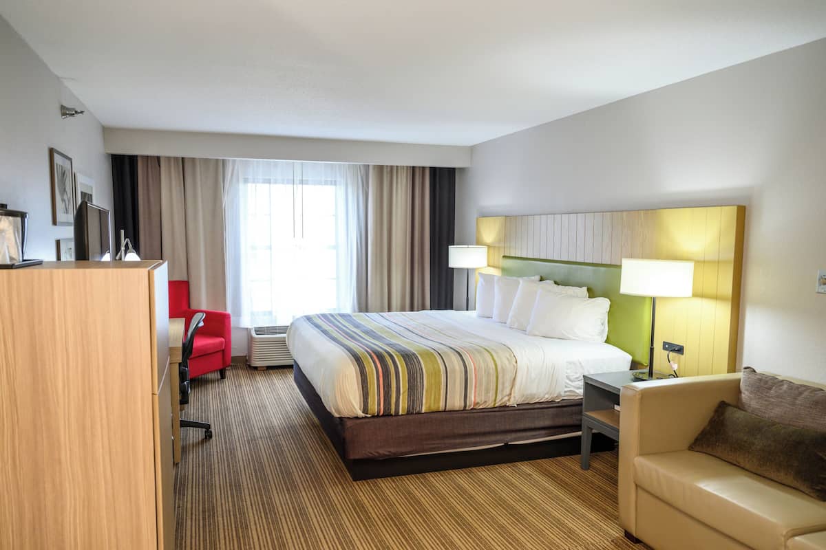 Suite, 1 King Bed with Sofa bed, Upper Floor (No Elevator) | Premium bedding, individually decorated, individually furnished, desk