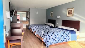 Premium bedding, down duvets, desk, laptop workspace