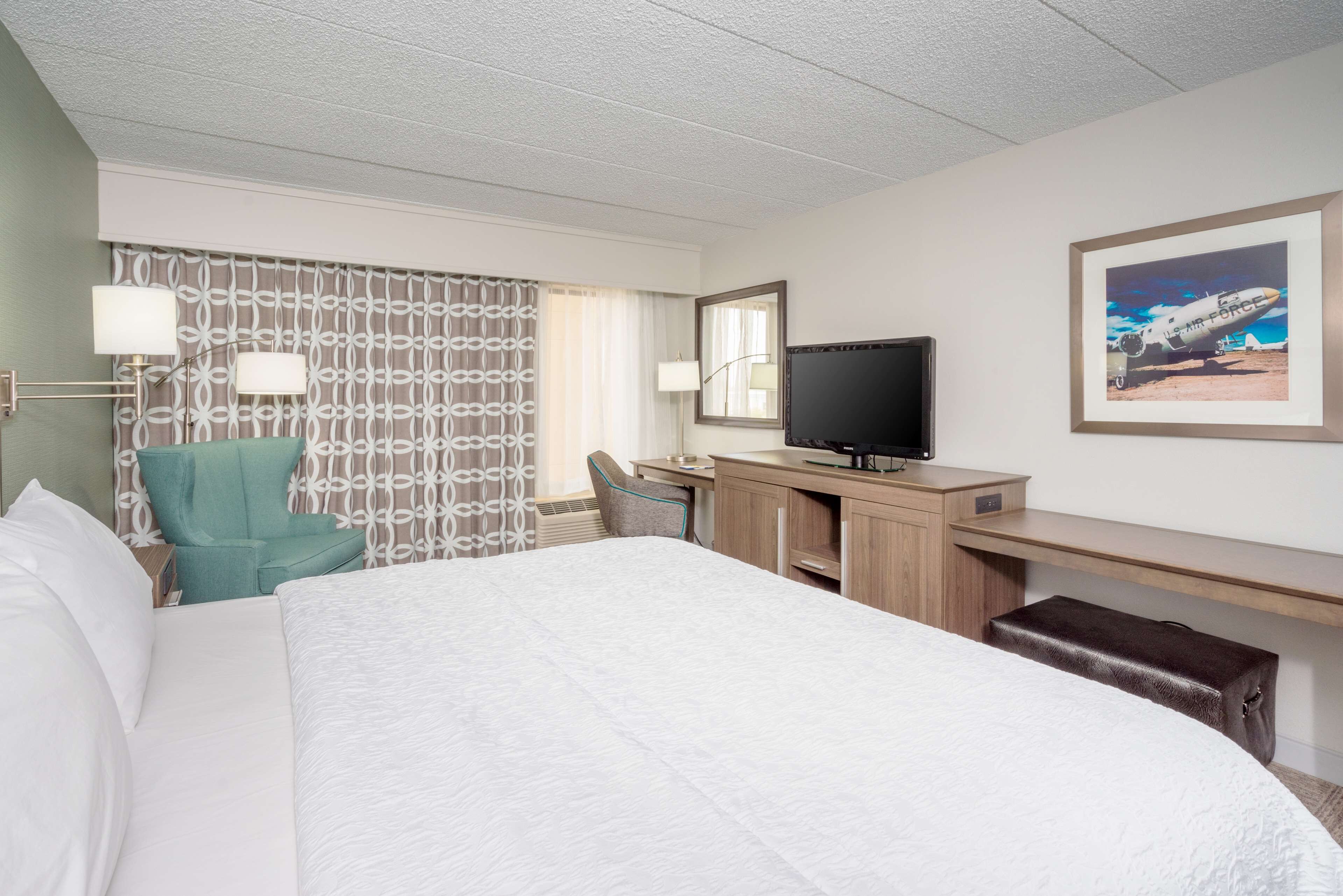 premium bedding, desk, laptop workspace, blackout curtains