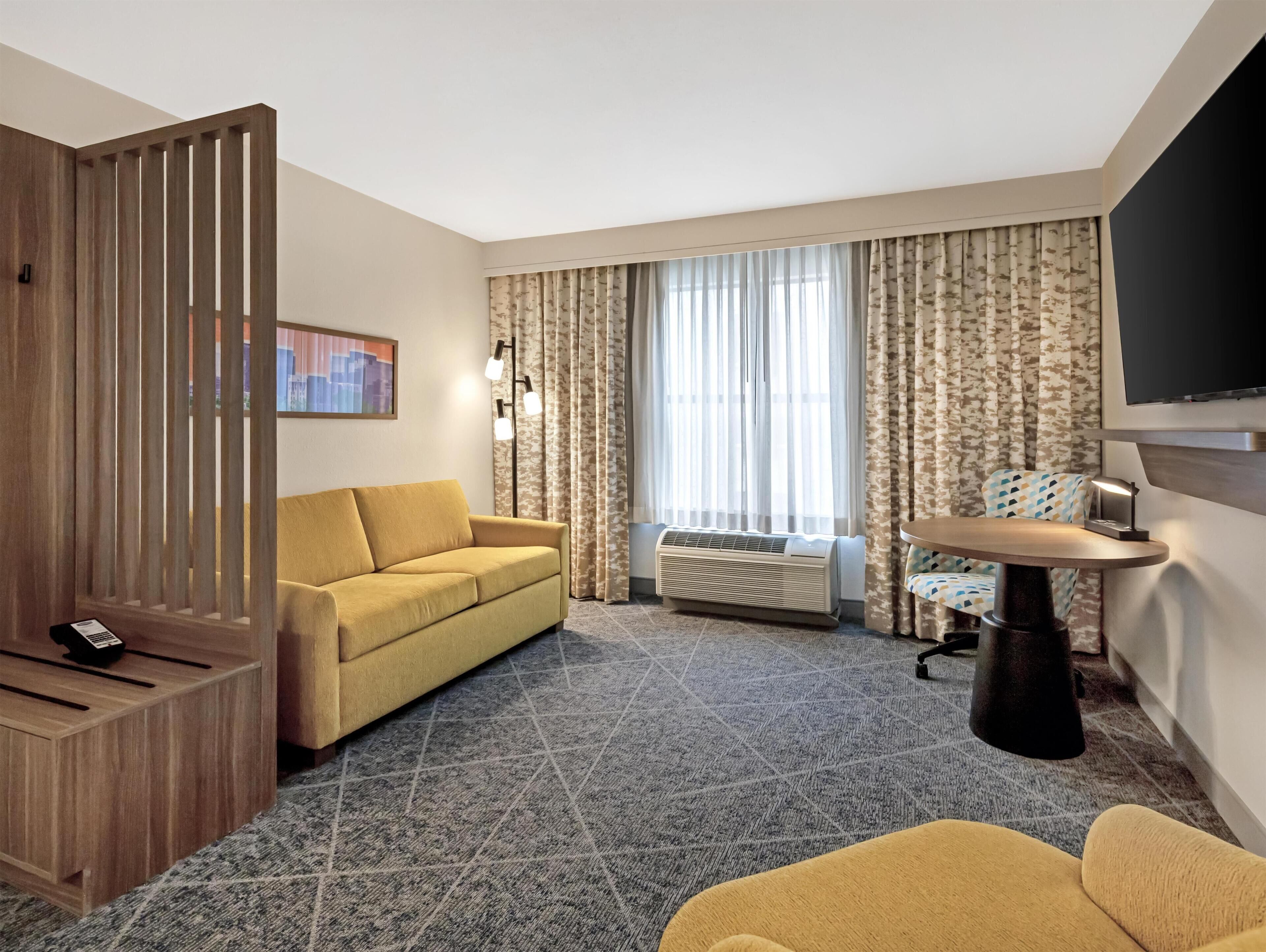Suite, 1 King Bed, Pool View | Living area | 27-inch TV with digital channels, video-game console