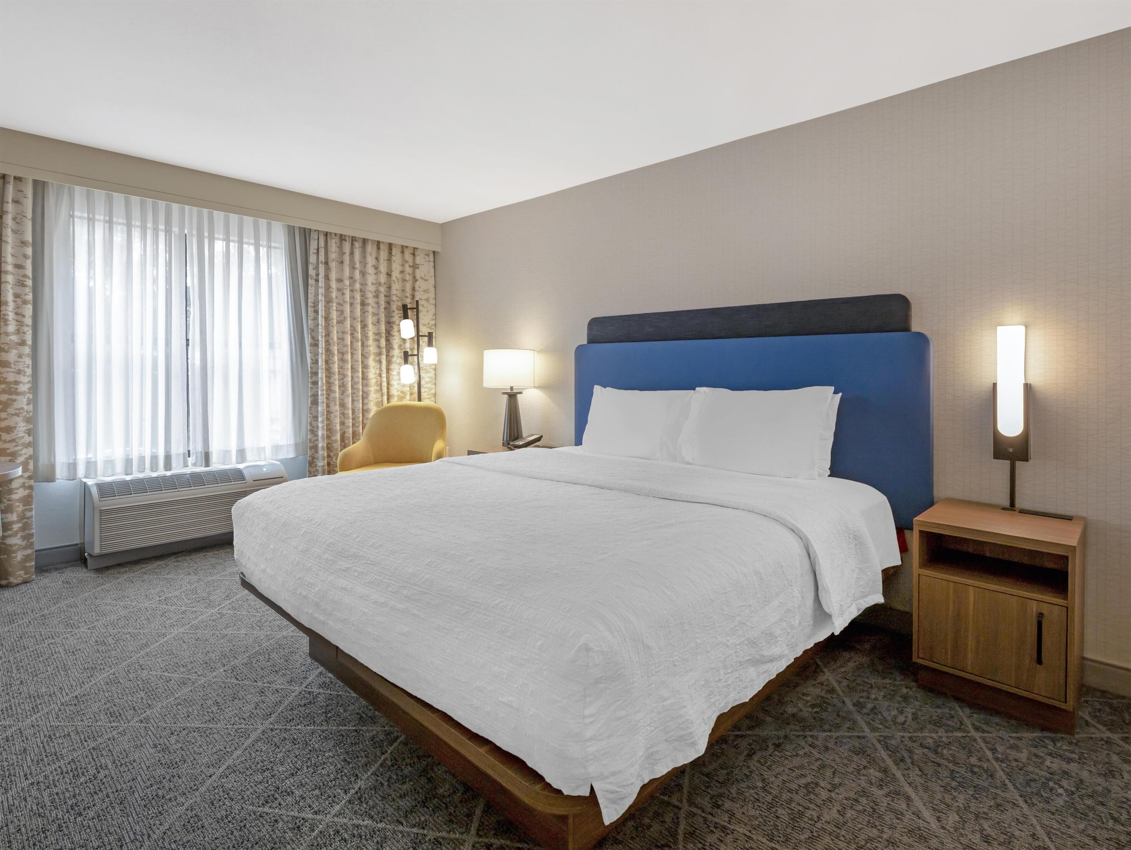Room, 1 King Bed with Sofa bed (Shower Only) | Premium bedding, down comforters, pillowtop beds, in-room safe
