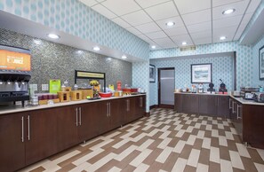 A modern kitchen area with a coffee station, a microwave, and a refrigerator. - Hampton Inn Cullman (Cullman)