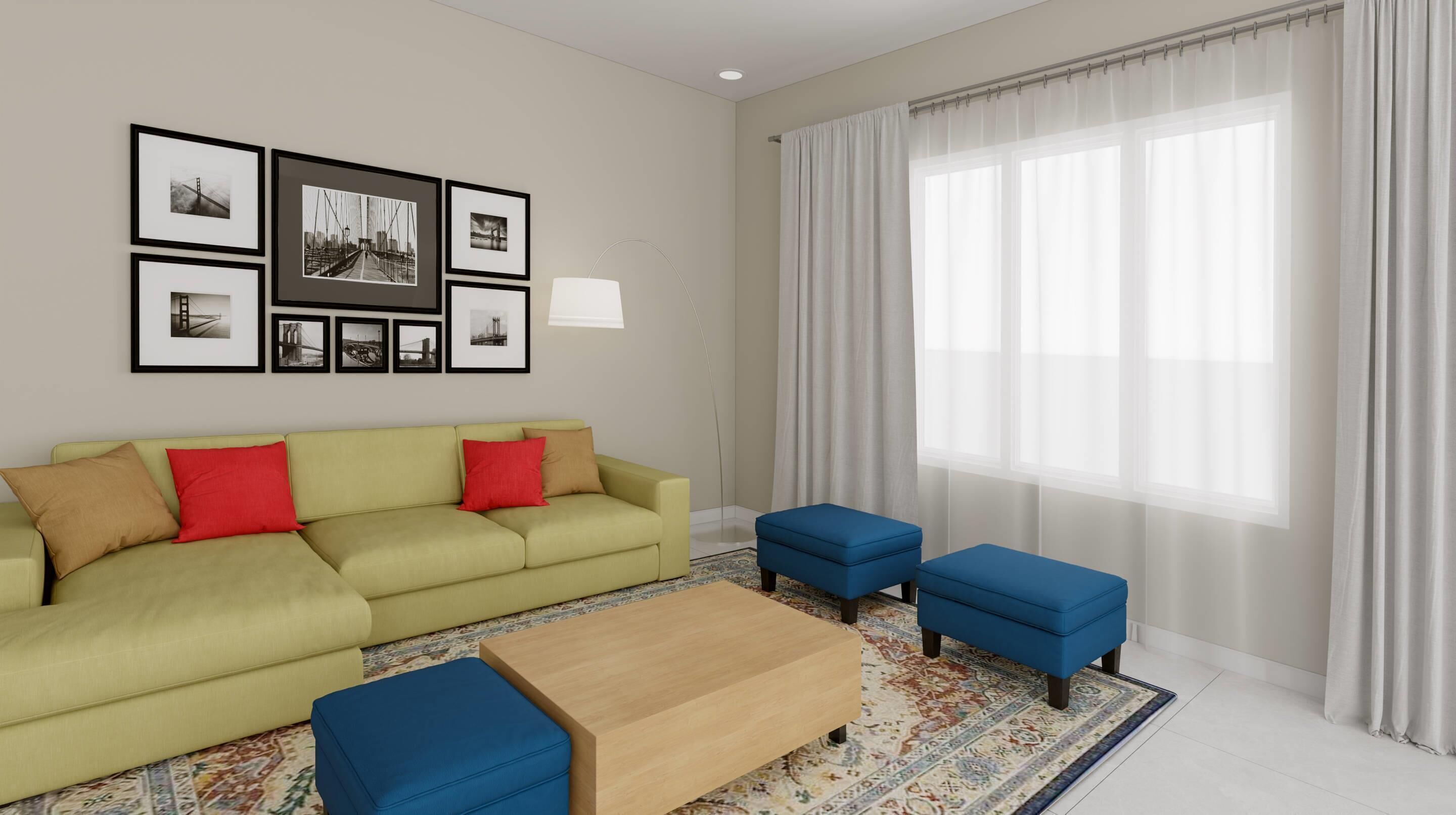 Un salon comprenant un canapé, des poufs, une table basse, un tapis et des tableaux encadrés accrochés au mur.