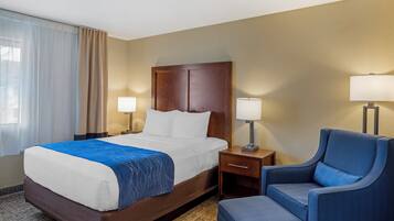 Premium bedding, desk, laptop workspace, blackout curtains