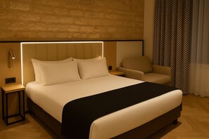Quarto conforto | Roupas de cama premium, frigobar, cofres nos quartos, escrivaninha