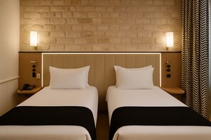 Ropa de cama de alta calidad y minibar 