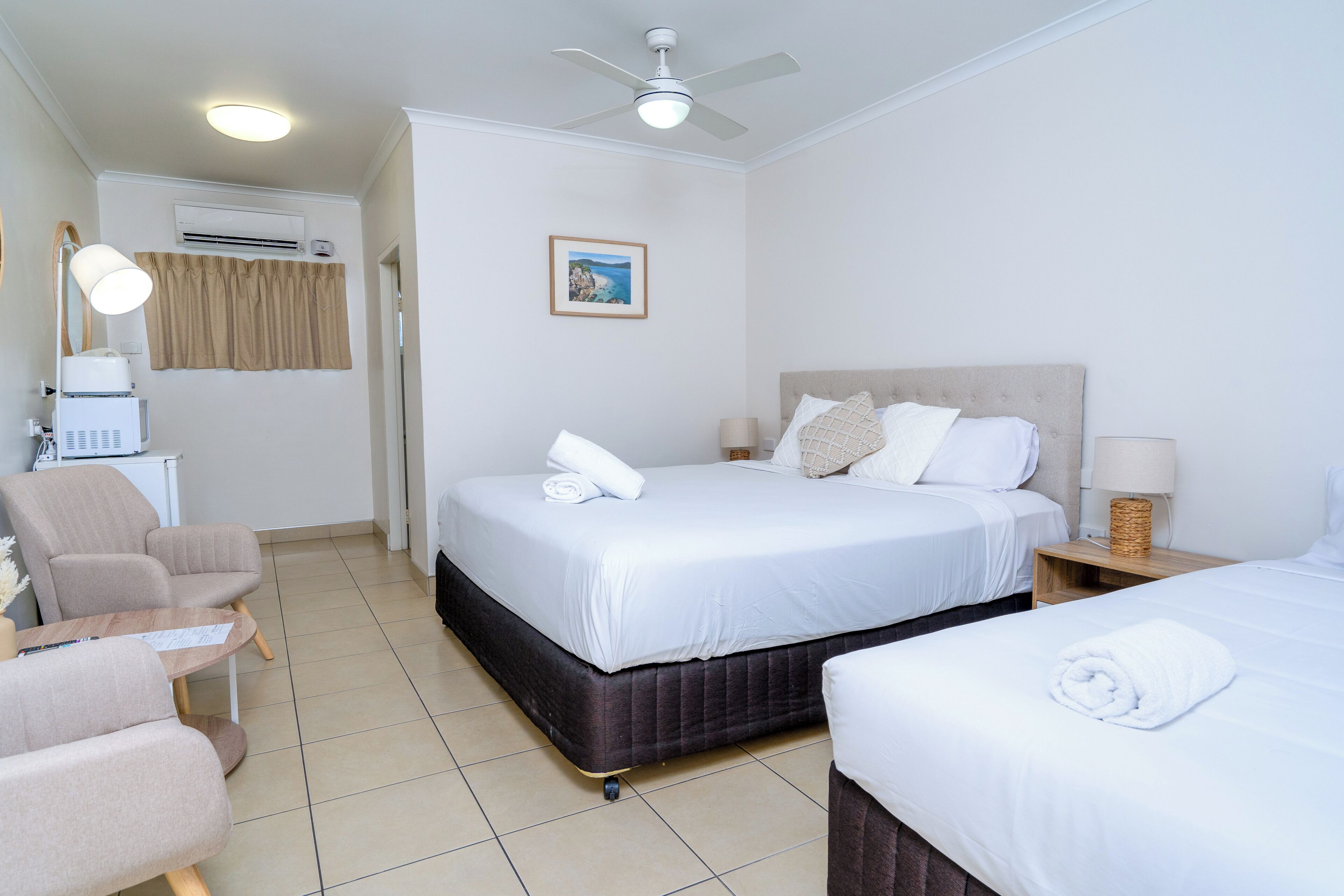 deluxe twin room, multiple beds | desk, laptop workspace, iron/ironing board, free wifi