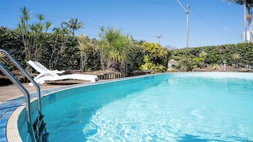 Outdoor pool, open 7:00 AM to 7:00 PM, sun loungers