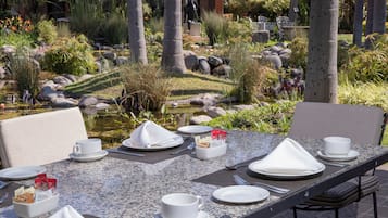 Breakfast, lunch, dinner served; Mexican cuisine, garden views