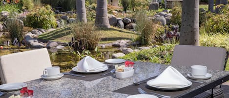 Breakfast, lunch, dinner served; Mexican cuisine, garden views