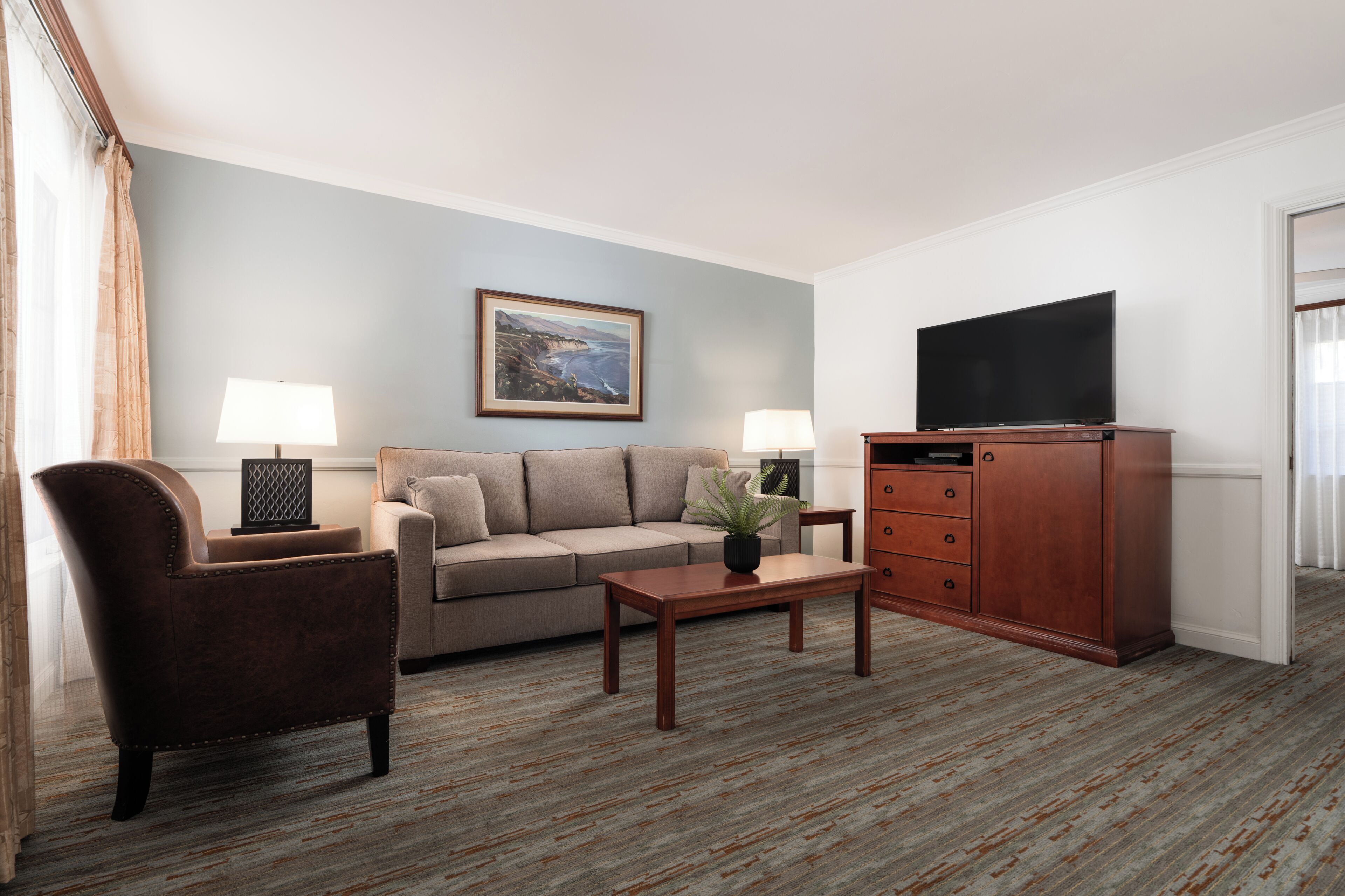 Dolphin Suite | Living area | Flat-screen TV, DVD player