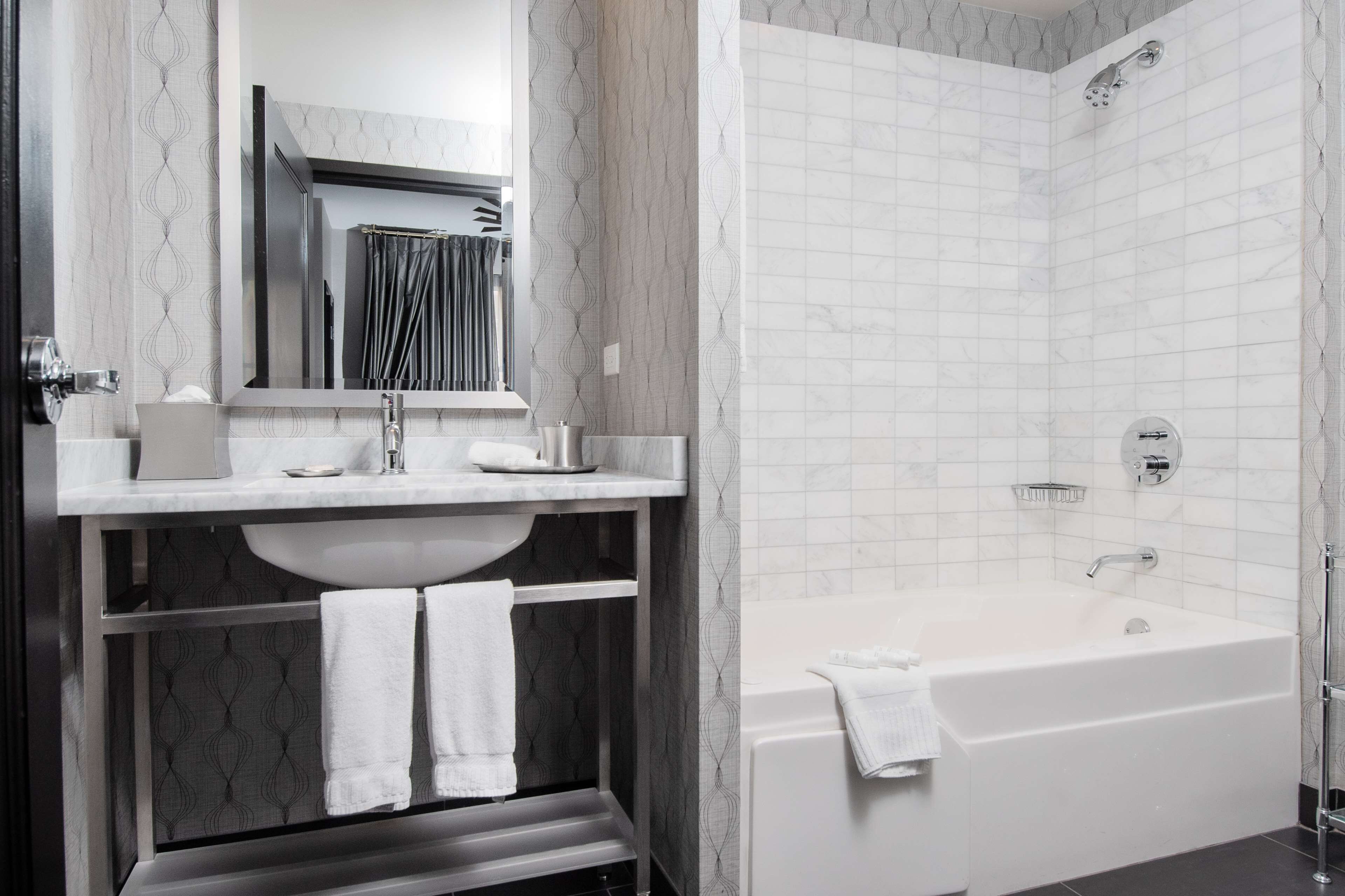 suite, 1 king bed, accessible (mobility tub one bedroom) | bathroom | combined shower/bathtub, designer toiletries, hair dryer, towels