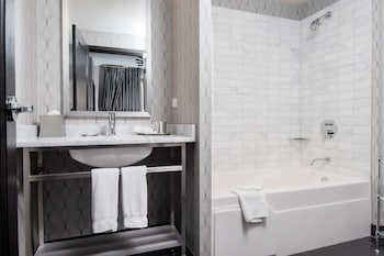 Suite, 1 King Bed, Accessible (Mobility Tub One Bedroom) | Bathroom | Combined shower/tub, designer toiletries, hair dryer, towels at The Allegro Royal Sonesta Hotel Chicago Loop