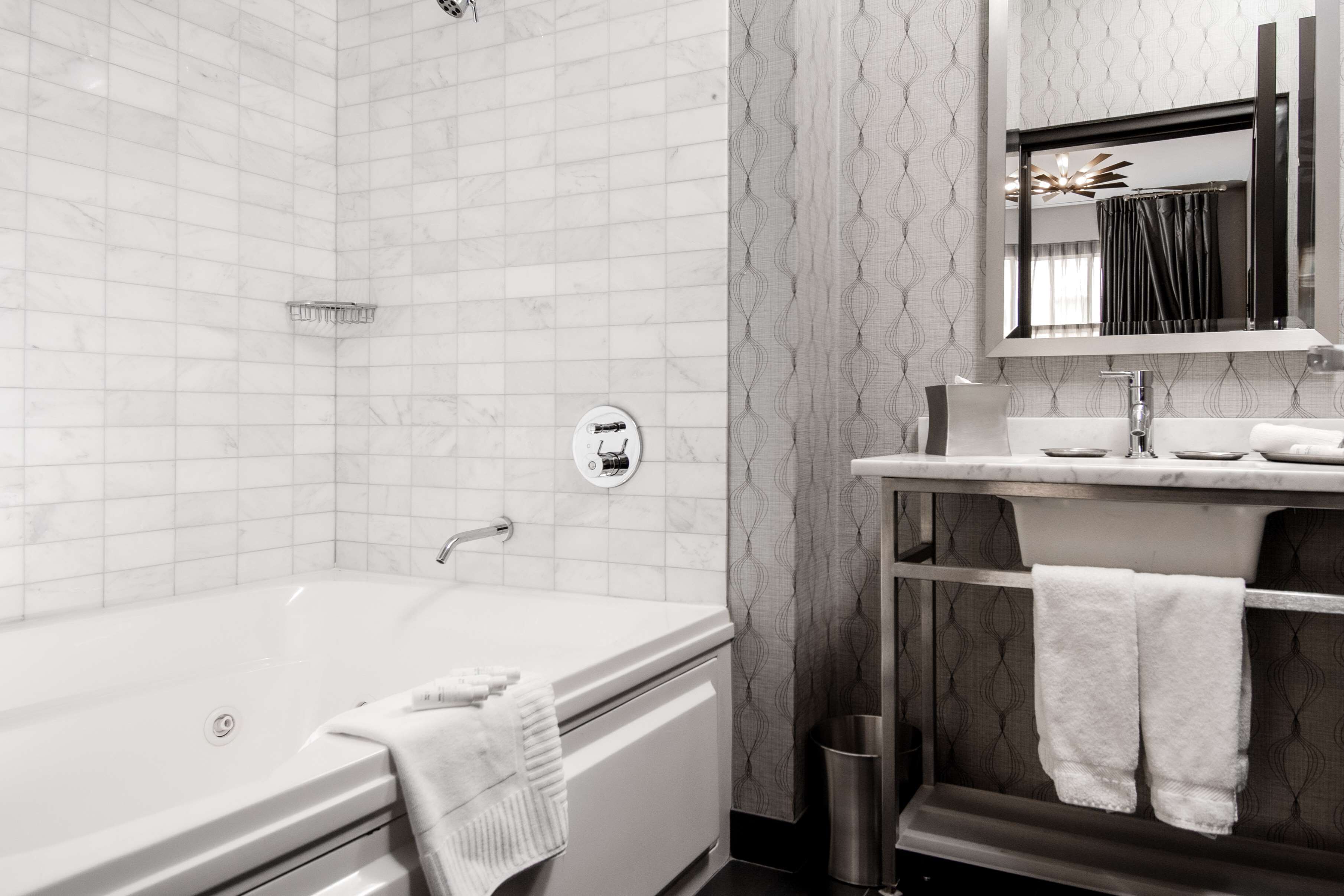 suite, 1 king bed (one bedroom suite king two person tub) | bathroom | combined shower/bathtub, designer toiletries, hair dryer, towels