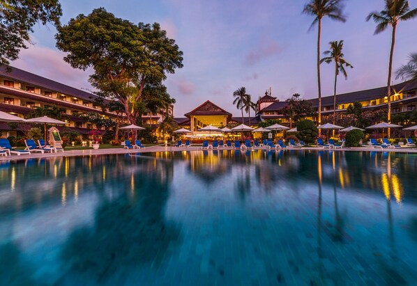Outdoor pool, open 7:00 AM to 11:00 PM, sun loungers