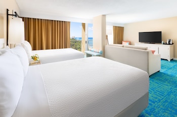 In-room safe, blackout drapes, iron/ironing board at The Twin Fin Hotel