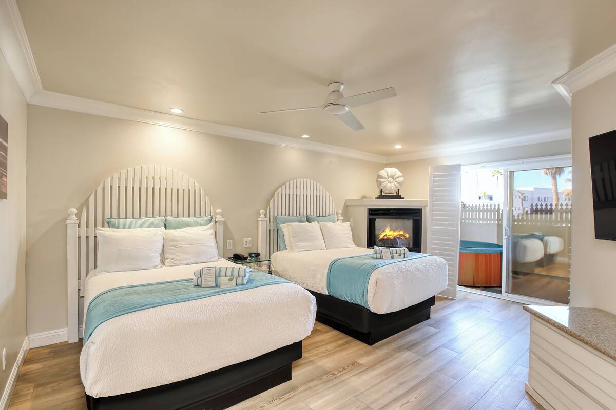 deluxe double room- 2 double beds, balcony with hot tub | balcony view