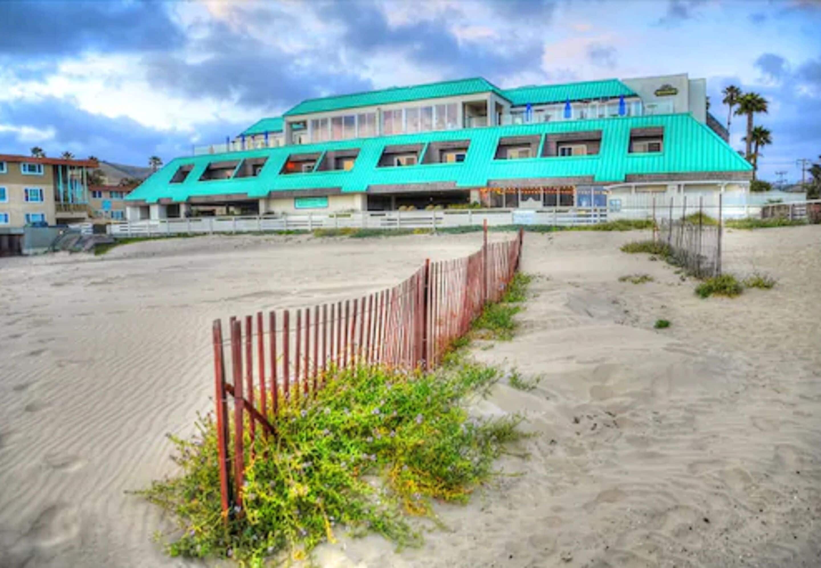 on the beach, sun-loungers, beach umbrellas, beach towels