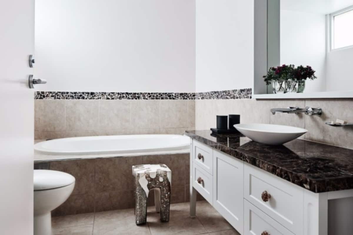 waterfront suite | bathroom | hair dryer, bathrobes, slippers, towels