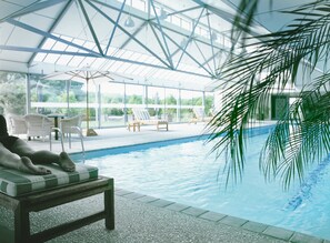 Indoor pool, open 7:00 AM to 7:00 PM, sun loungers