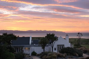 Free minibar items, in-room safe, individually decorated - Wharekauhau Luxury Country Estate (Ocean Beach)