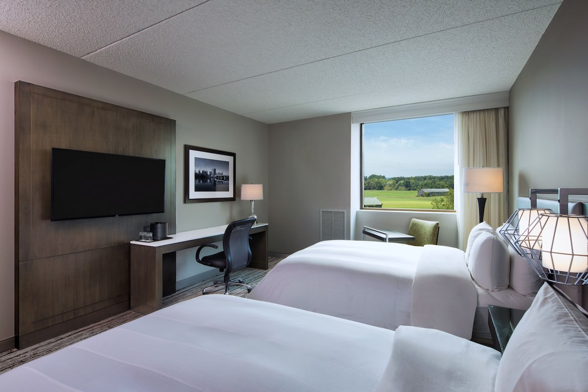Premium bedding, down comforters, pillowtop beds, in-room safe