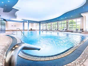 Indoor pool, open 6:00 AM to 10:00 PM, pool loungers