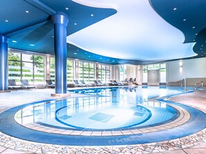 Indoor pool, open 6:00 AM to 10:00 PM, pool loungers