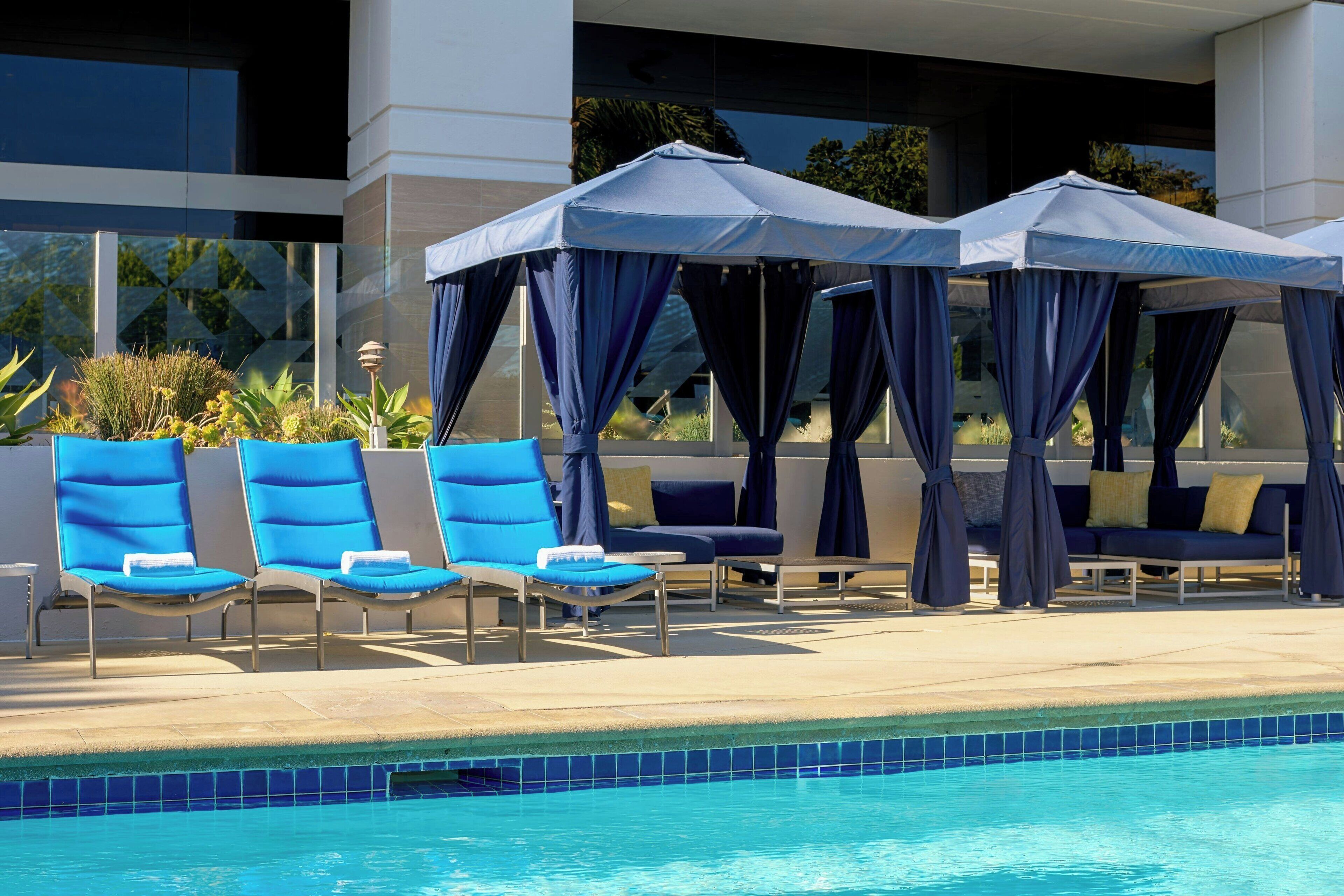 Outdoor pool, open 6:00 AM to 11:00 PM, pool umbrellas, sun loungers