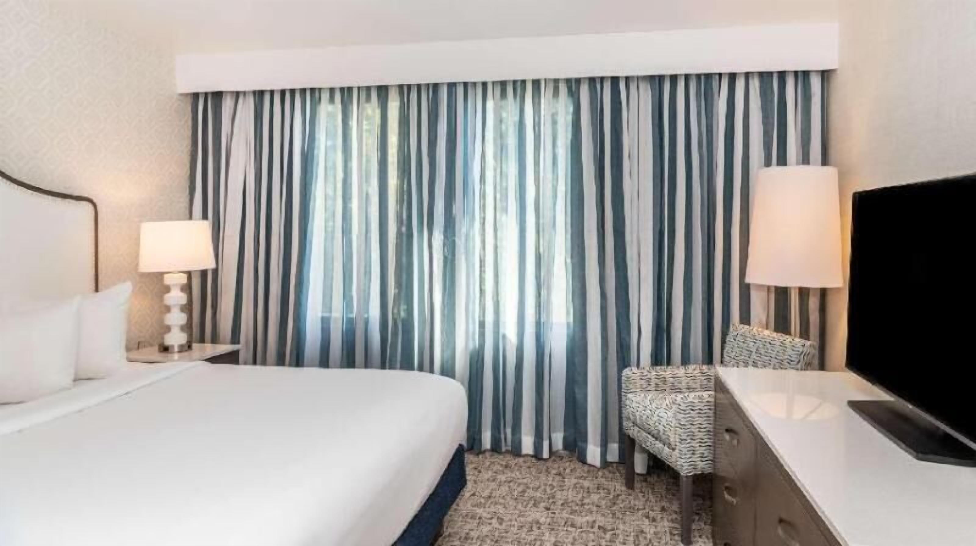 Premium bedding, desk, iron/ironing board, free cribs/infant beds