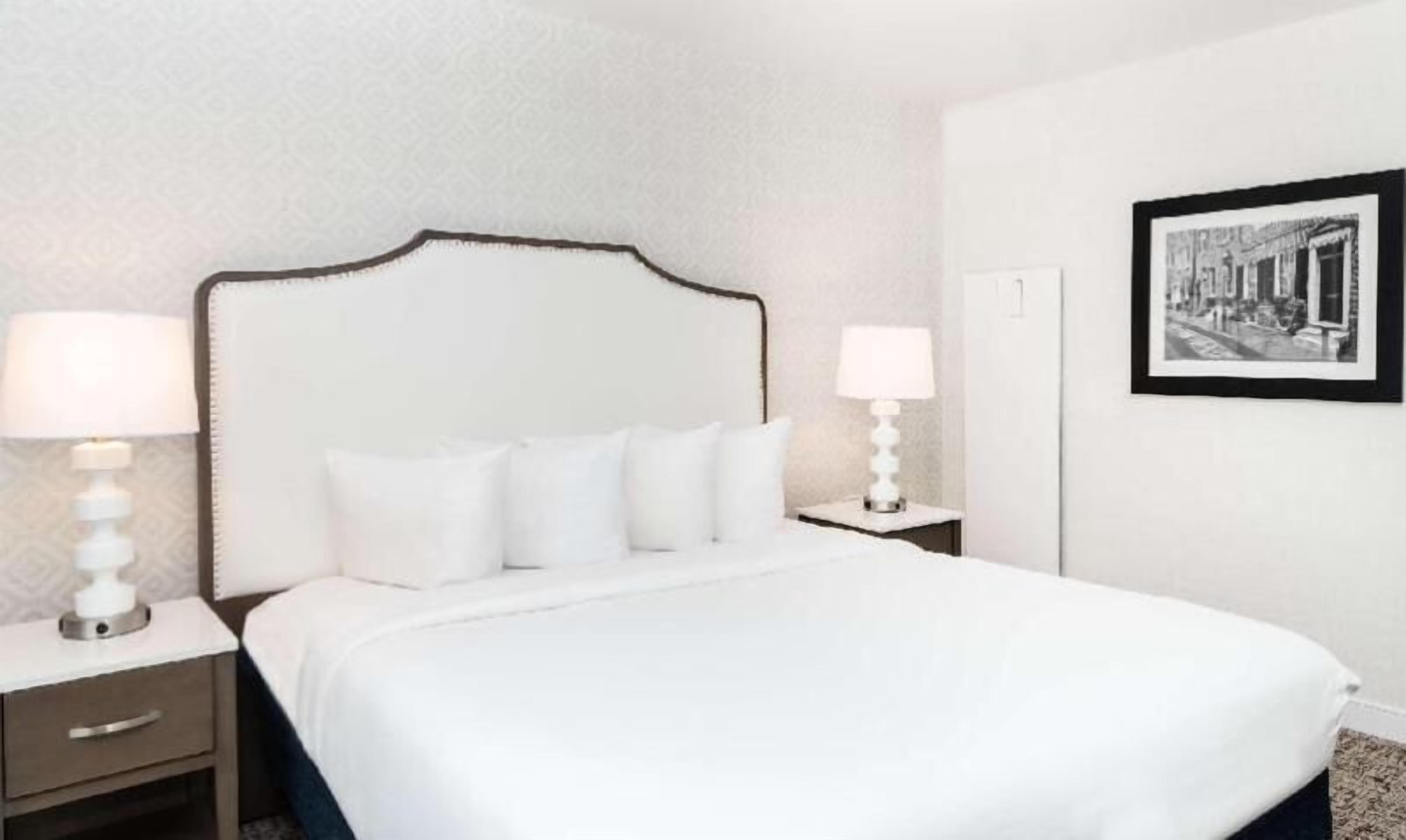 Premium bedding, desk, iron/ironing board, free cribs/infant beds