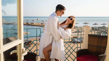 Couples can enjoy romantic moments on this balcony overlooking the beach and sea.