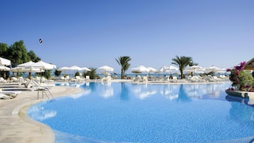 3 outdoor pools, open 7:00 AM to 5:00 PM, pool umbrellas, sun loungers