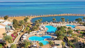 Private beach, beach umbrellas, beach towels, windsurfing