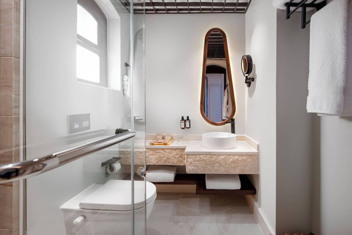 shower, eco-friendly toiletries, hair dryer, slippers