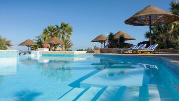 4 outdoor pools, open 6:00 AM to 6:00 PM, pool umbrellas, sun loungers