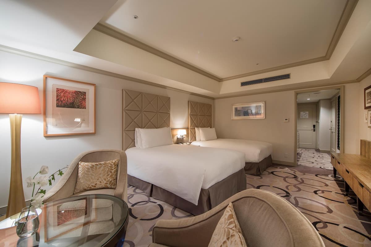 Deluxe-Zweibettzimmer | Wohnbereich