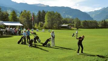 Enjoy a round of golf with breathtaking views of the surrounding mountains.