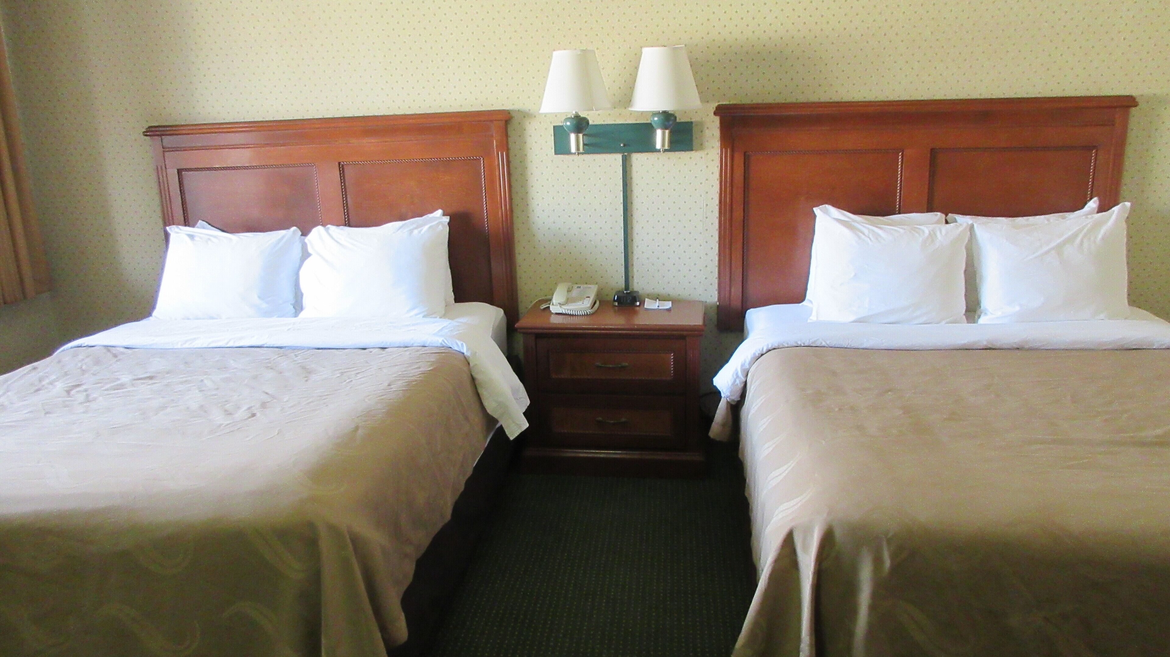 standard room, 2 queen beds | in-room safe, desk, iron/ironing board, free cots/infant beds