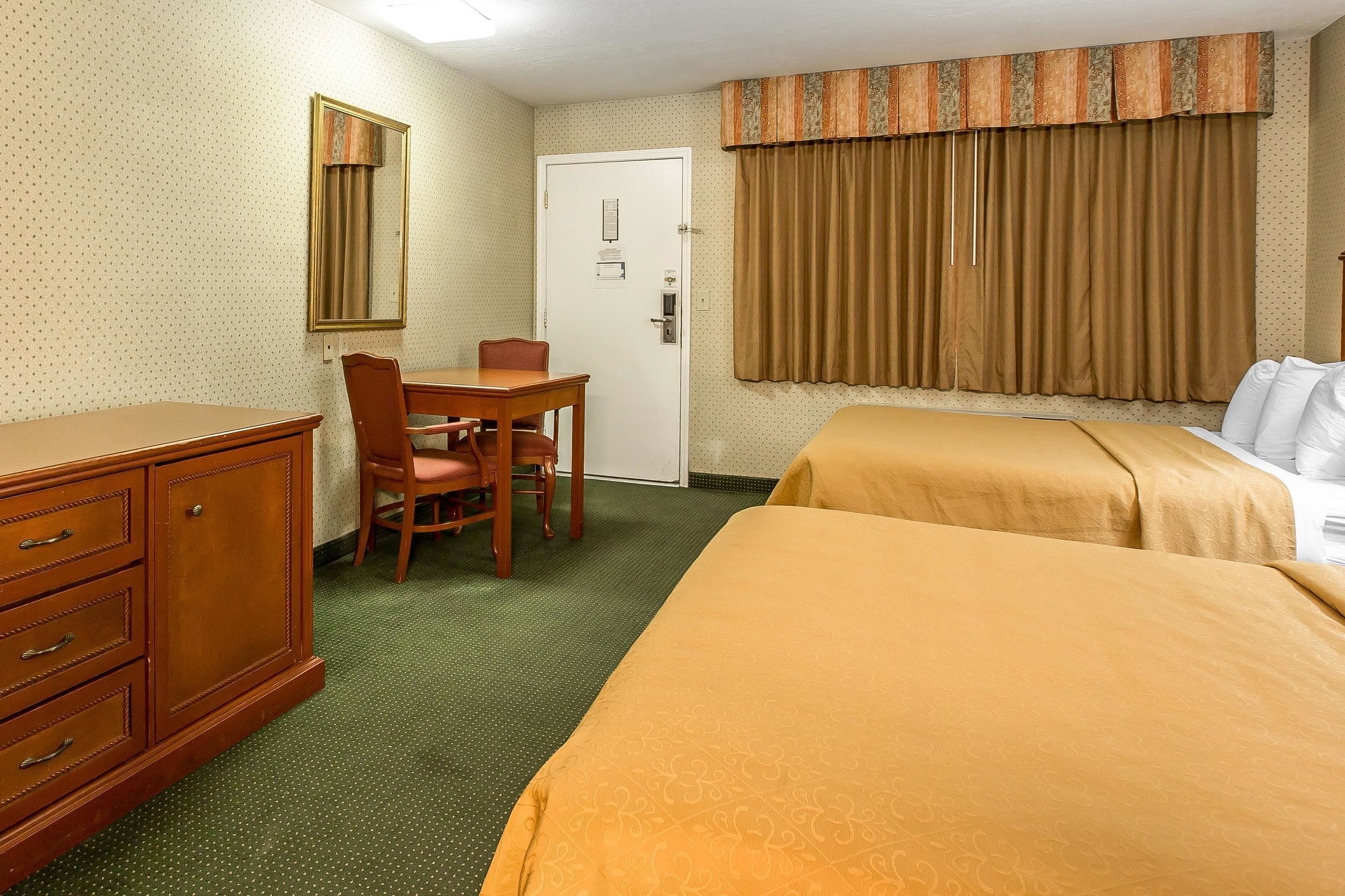 standard room, 2 queen beds | in-room safe, desk, iron/ironing board, free cots/infant beds